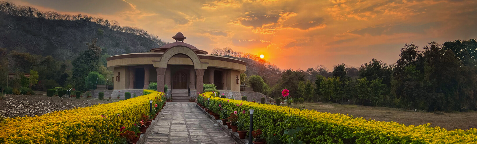 Sri Vidya Shrine Khajuraho Sunrise khajuraho shrine sunrise lush banner - Himalayan Institute